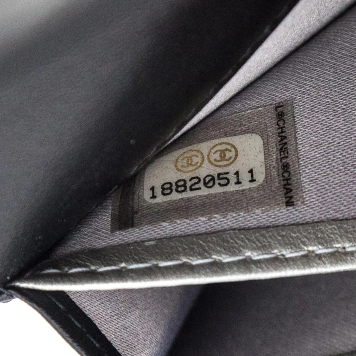 Chanel Black Camellia Embossed Long Flap Wallet