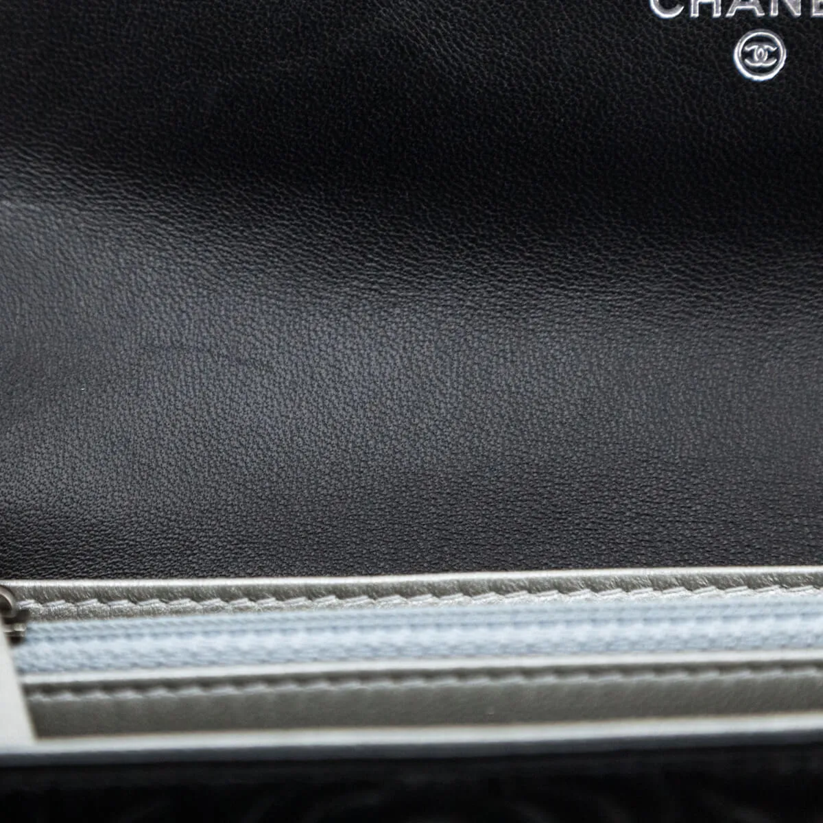 Chanel Black Camellia Embossed Long Flap Wallet